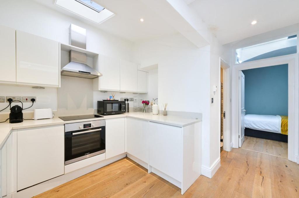 Cozy Hideaway In South Ken! Apartment London Bagian luar foto